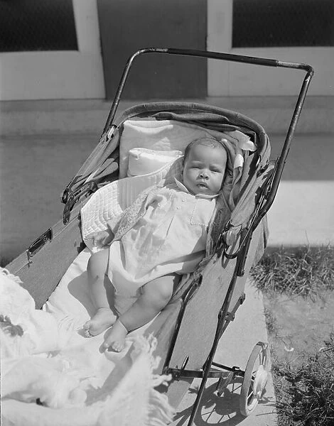Baby taking a sun bath, Frederick Douglass housing project, Anacostia, D. C. 1942. Creator: Gordon Parks