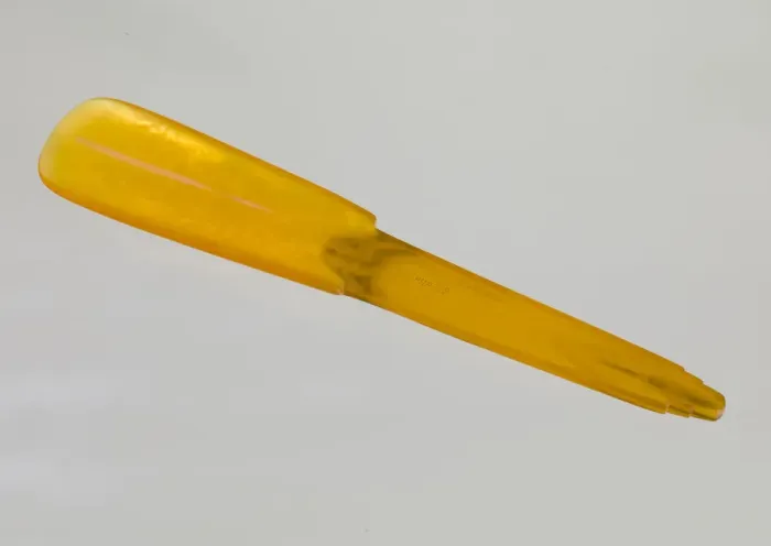 Framed Print : Bakelite shoe horn from dresser set owned by Lena Horne, mid 20th Century Framed Print : Bakelite shoe horn from dresser set owned by Lena Horne, mid 20th Century