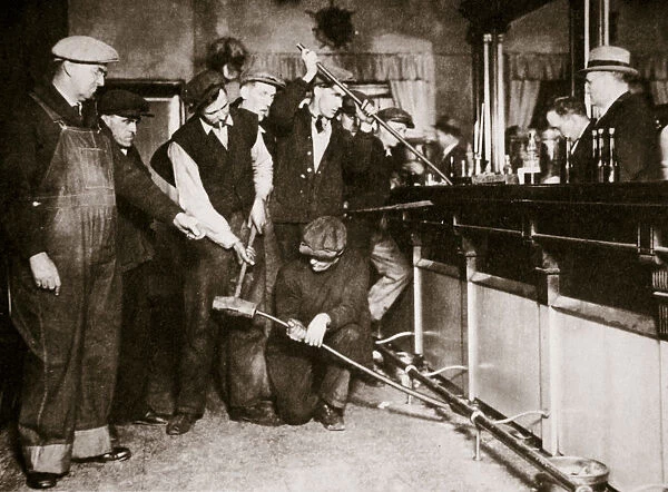 A bar in Camden, New Jersey, being forcibly dismantled by dry agents, USA, 1920s