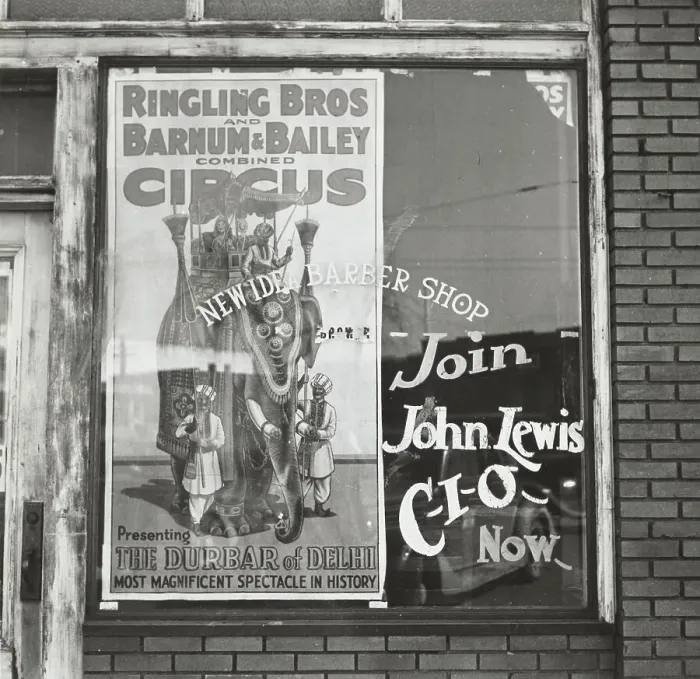 Framed Print : Barber shop window [with circus poster] in Birmingham, Alabama, 1937-01 - 1937-02. Creator: Arthur Rothstein