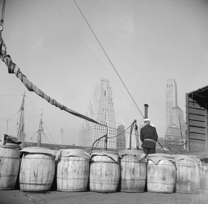 Framed Print : Barrels of fish on the docks at Fulton fish market ready to be shipped to... New York, 1943. Creator: Gordon Parks