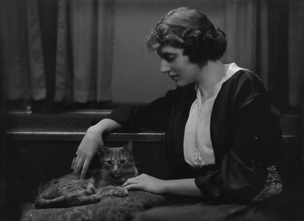 Bartlett, Eleanor, Miss, with Buzzer the cat, portrait photograph, 1914 Apr. 4. Creator: Arnold Genthe