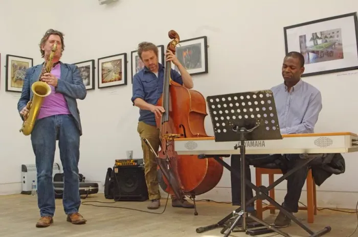 Framed Print : Basil Hodge, Ed Jones and Riaan Vosloo, Clock Tower Cafe, Croydon, London, 2015. Artist