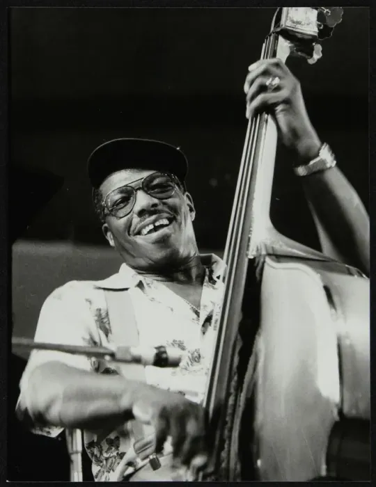 Framed Print : Bassist Major Holley, Beaulieu, Hampshire, July 1977. Artist: Denis Williams Framed Print : Bassist Major Holley, Beaulieu, Hampshire, July 1977. Artist: Denis Williams