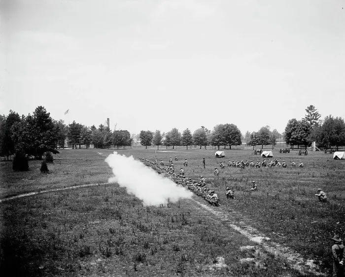 Framed Print : Battalion firing, kneeling, M[ichigan] M[ilitary] A[cademy], Orchard Lake, Michigan, c1900. Creator: Unknown