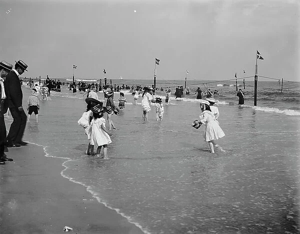 On the beach at Rockaway, N.Y. between 1900 and 1906. Creator: Unknown