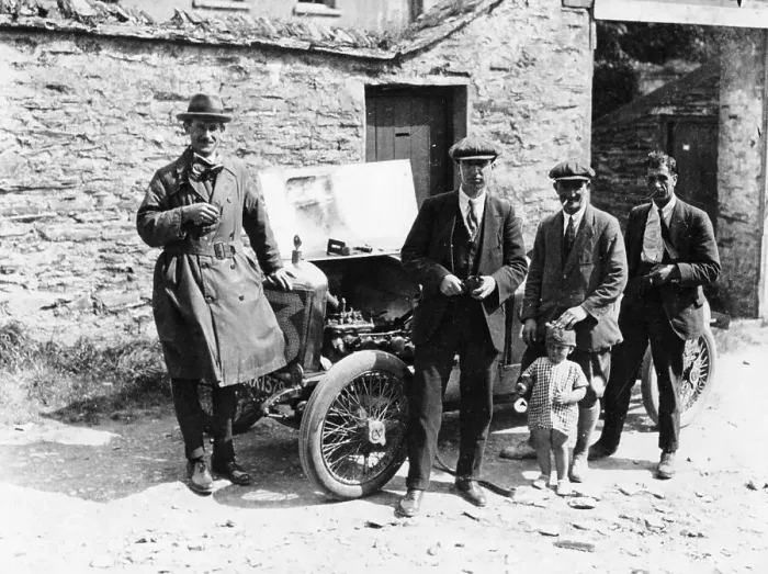 Framed Print : Bedford standing at the front of a car, with onlookers Framed Print : Bedford standing at the front of a car, with onlookers