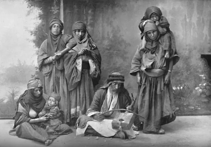 Framed Print : A Bedouin musician and his audience, 1902 Framed Print : A Bedouin musician and his audience, 1902