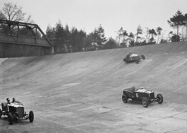 Bentley of Major H Butler and Sunbeam of BO Davis racing at a BARC meeting, Brooklands, 1930