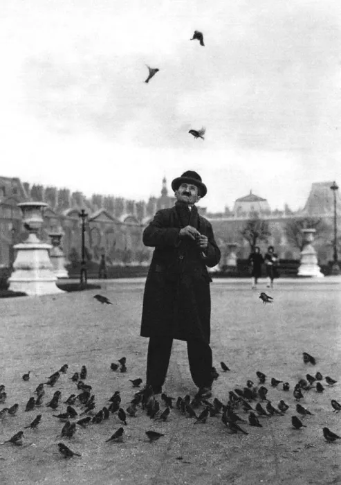 Framed Print : A bird charmer, Paris, 1931. Artist: Ernest Flammarion Framed Print : A bird charmer, Paris, 1931. Artist: Ernest Flammarion