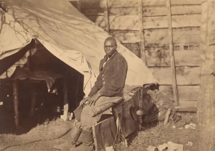 Framed Print : [Black Soldier in Camp], ca. 1863. Creator: Alexander Gardner