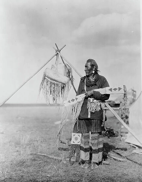 In a Blackfoot camp, c1927. Creator: Edward Sheriff Curtis