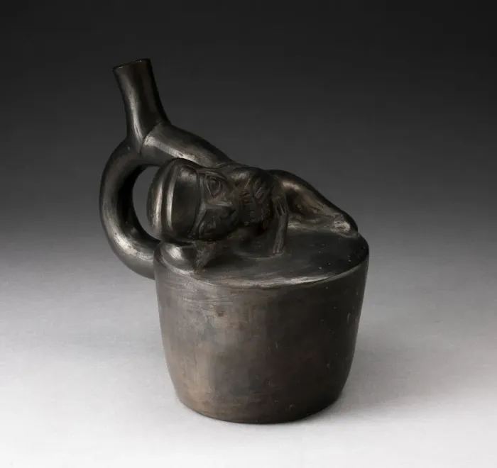 Framed Print : Blackware Handle Spout Vessel with Relief of a Reclining Musician with Pipes, 100 B. C. / A Framed Print : Blackware Handle Spout Vessel with Relief of a Reclining Musician with Pipes, 100 B. C. / A