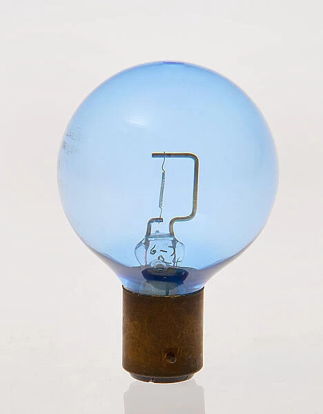 Blue headlamp bulb circa 1930. Creator: Unknown