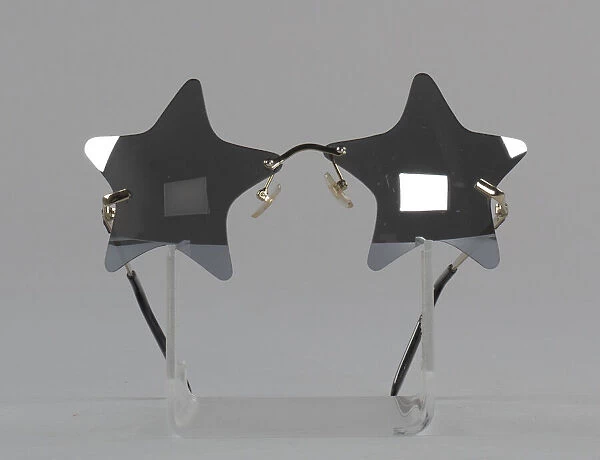 Bootsy Collins style star-shaped mirrored lens sunglasses, 1993-2013. Creator: elope, inc