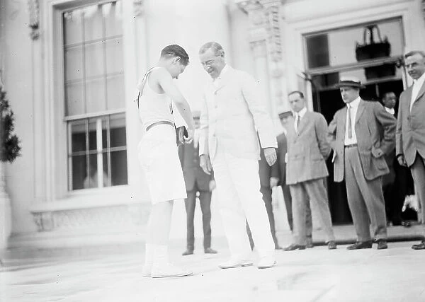 Boy Scouts - Relay Race Starting At White House, Fred Reed Shaking Hands with President Wilson, 1913 Creator: Harris & Ewing. Boy Scouts - Relay Race Starting At White House, Fred Reed Shaking Hands with President Wilson