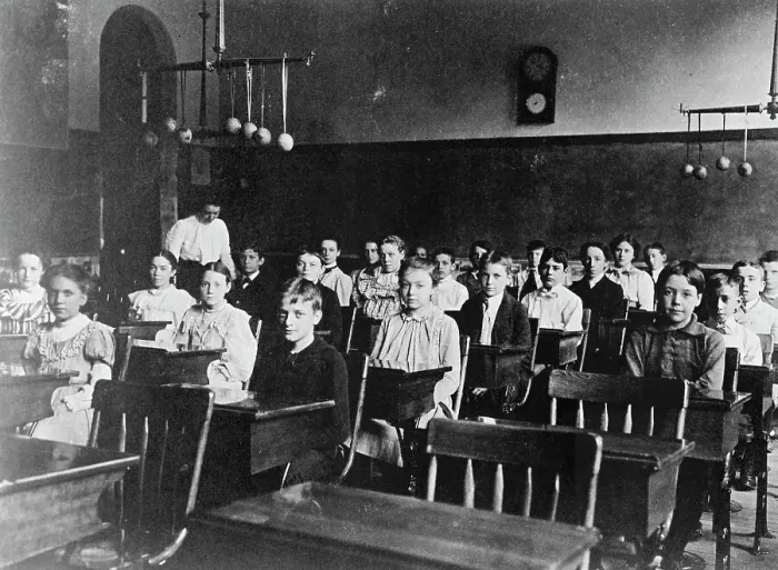 Framed Print : Boys and girls seated at desks in Washington, D.C. classroom, (1899?). Creator: Frances Benjamin Johnston Framed Print : Boys and girls seated at desks in Washington, D.C. classroom, (1899?). Creator: Frances Benjamin Johnston