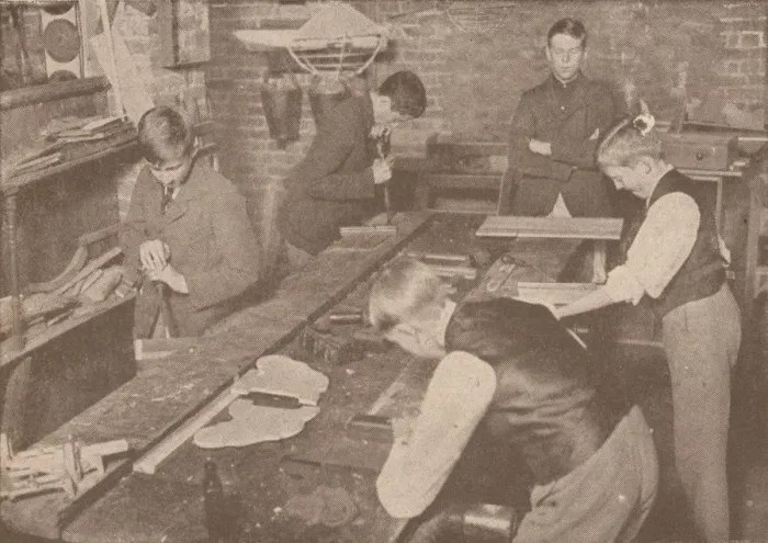 Framed Print : Boys of Harrow School making splints, crutches and other articles for the wounded, c1916 (1928) Framed Print : Boys of Harrow School making splints, crutches and other articles for the wounded, c1916 (1928)