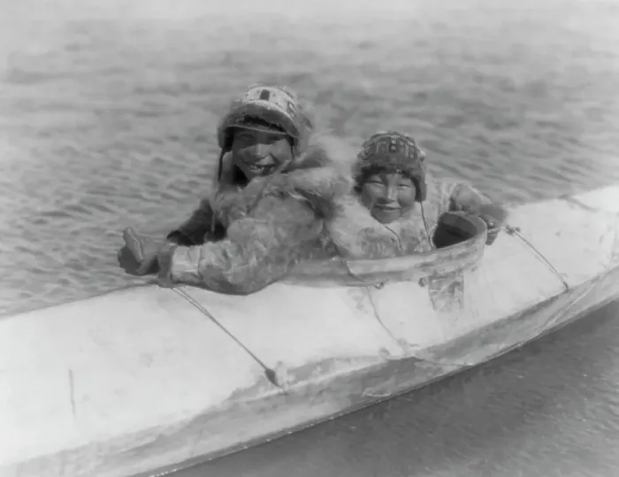 Framed Print : Boys in a kaiak (i.e. kayak)-Nunivak, c1929. Creator: Edward Sheriff Curtis Framed Print : Boys in a kaiak (i.e. kayak)-Nunivak, c1929. Creator: Edward Sheriff Curtis