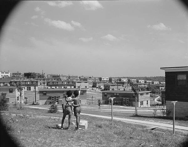 Boys overlooking the project, Frederick Douglass housing project, Anacostia, D.C. 1942. Creator: Gordon Parks