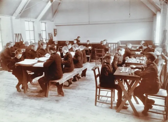 Framed Print : Boys playing dominoes and reading at the Boys Home Industrial School, London, 1900 Framed Print : Boys playing dominoes and reading at the Boys Home Industrial School, London, 1900
