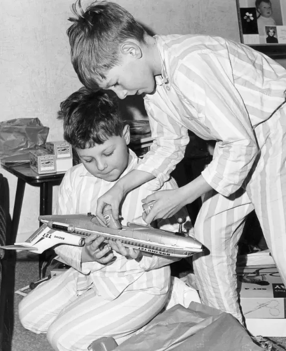 Framed Print : Boys playing with a model plane, c1960s Framed Print : Boys playing with a model plane, c1960s