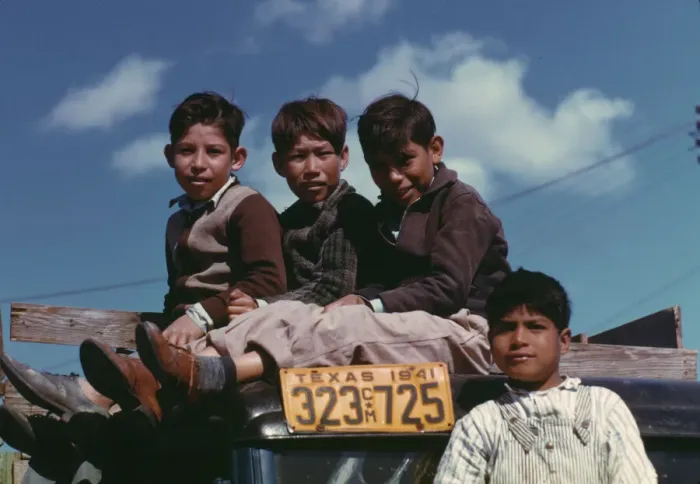 Framed Print : Boys sitting on truck parked at the FSA... labor camp, Robstown, Tex. 1942. Creator: Arthur Rothstein Framed Print : Boys sitting on truck parked at the FSA... labor camp, Robstown, Tex. 1942. Creator: Arthur Rothstein