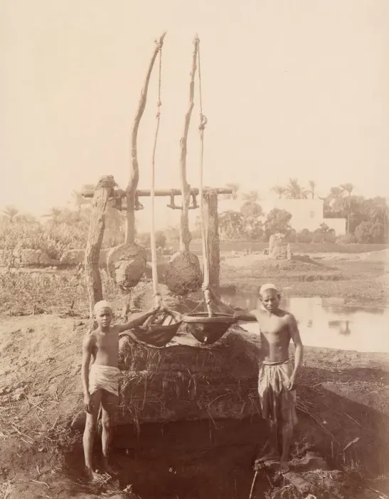 Framed Print : Two Boys Beside a Well, 1880s. Creator: Unknown Framed Print : Two Boys Beside a Well, 1880s. Creator: Unknown