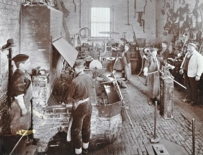 Framed Print : Boys at work in the smiths shop, Feltham Industrial School, London, 1908 Framed Print : Boys at work in the smiths shop, Feltham Industrial School, London, 1908