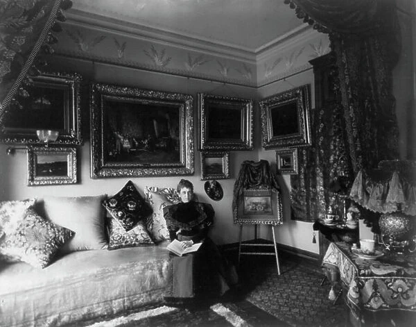 Brazilian Legation - Mendonca residence - Mme. Medonca seated in her boudoir, between 1890 and 1950. Creator: Frances Benjamin Johnston