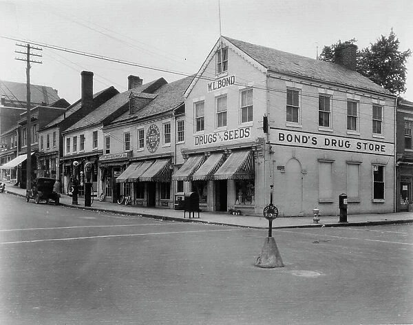 Brick Row, Commerce and Main Streets, located in the vicinity of Fredericksburg...Virginia, c1925. Creator: Frances Benjamin Johnston