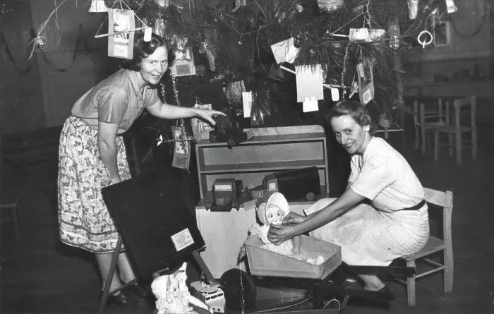 Framed Print : Brisbane Kindergarten Teachers College students / staff with presents and the Christmas tree, 1955. Creator: Unknown Framed Print : Brisbane Kindergarten Teachers College students / staff with presents and the Christmas tree, 1955. Creator: Unknown