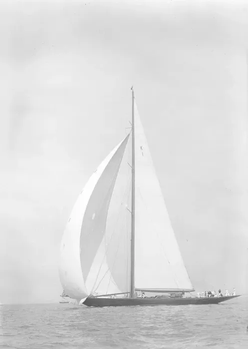 Framed Print : Britannia sails downwind under spinnaker, 1935. Creator: Kirk & Sons of Cowes