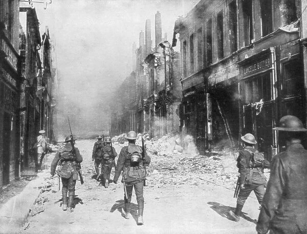 A British army patrol, Cambrai, France, First World War, 9 October 1918