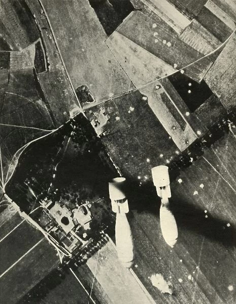More British Bombs on an Enemy-Held Aerodrome, 1939-1940, (1941). Creator: Unknown