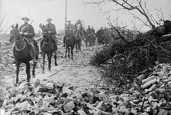 British Cavalry passing thro' wrecked village, 21 Apr 1917.. Creator: Bain News Service