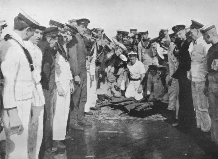 Framed Print : British sailors round a hole in the deck of their vessel, 1915 Framed Print : British sailors round a hole in the deck of their vessel, 1915