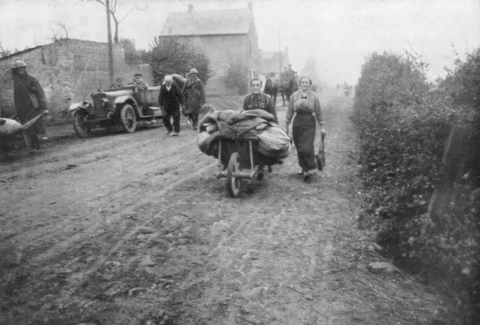 Framed Print : A British soldier helping a woman return to her village, France, 1918 Framed Print : A British soldier helping a woman return to her village, France, 1918