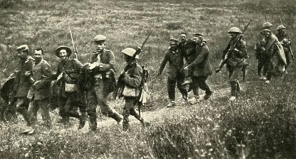 British soldiers with German prisoners of war, northern France, First World War, 1916, (c1920)