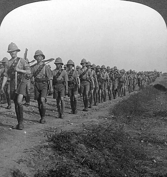 British soldiers marching through the desert to Baghdad, World War I, 1914-1918. Artist: Realistic Travels Publishers