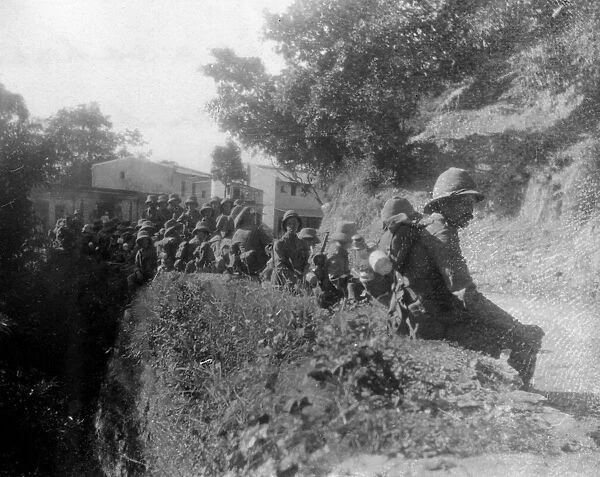 British soldiers resting on a route march, between kalsi and Chakrata, India, 1917