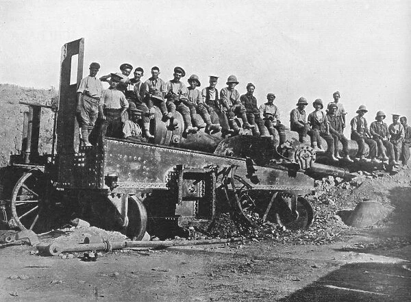 British soldiers on a wrecked Turkish gun, 1915