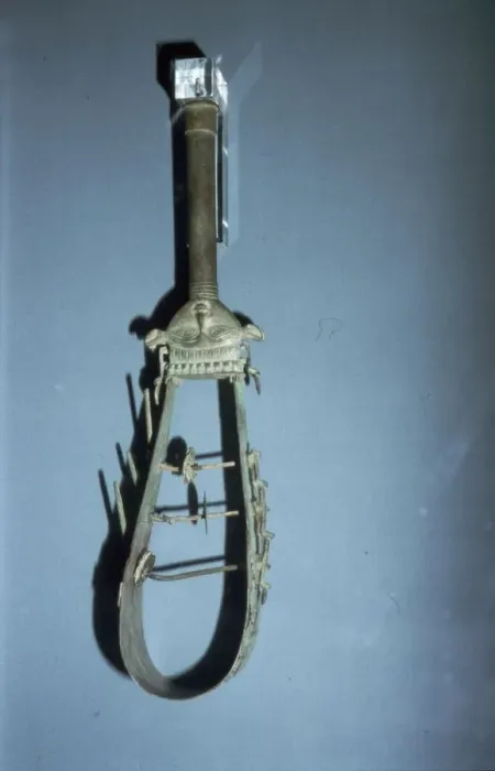 Framed Print : Bronze arched sistrum with Hathor head decoration, late Period, after 600BC Framed Print : Bronze arched sistrum with Hathor head decoration, late Period, after 600BC