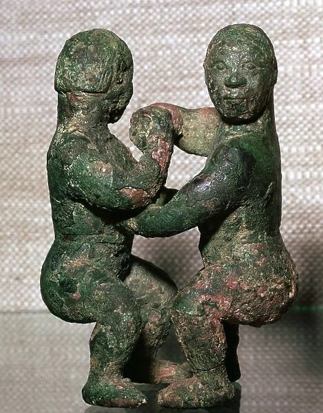 Bronze figures of two wrestlers, Eastern Zhou Dynasty, China, c5th-4th Century BC