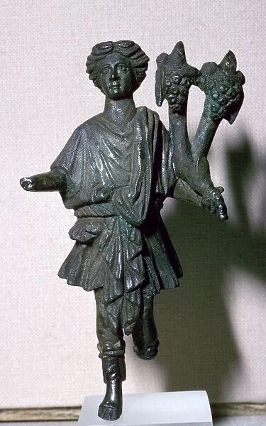 Bronze lar holding a double cornucopia