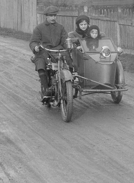 Bill Brunell riding a Clyno motorcycle and sidecar, c1920. Artist: Bill Brunell