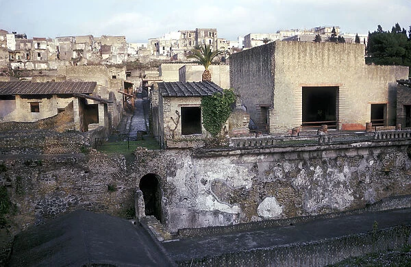 Buildings of Herculaneum with houses of the modern town of Ercolano above, Italy