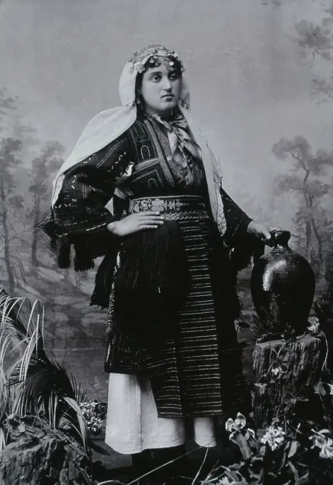 Framed Print : A Bulgarian woman in national dress with a water jug, early 20th century. Creator: Unknown Framed Print : A Bulgarian woman in national dress with a water jug, early 20th century. Creator: Unknown