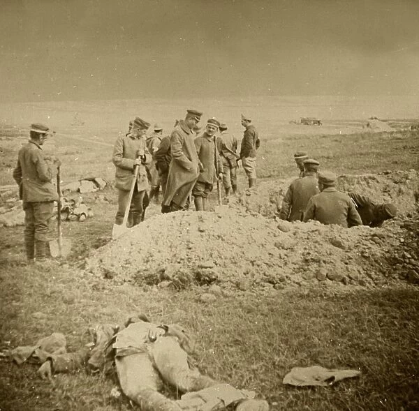Burying bodies, Sainte-Marie-a-Py, northern France, c1914-c1918