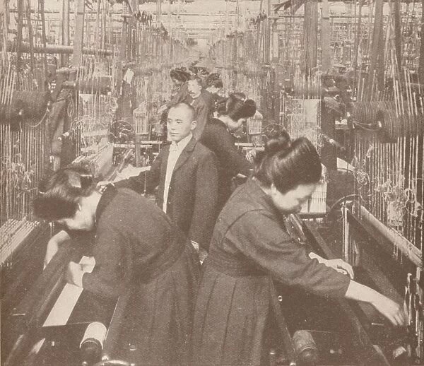 The busy interior of a flourishing silk factory in Japan, 1907
